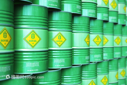 创意抽象生态替代可持续能源和环境保护节约商业概念3D以选择重点效果说明工业储存仓库中的绿色堆叠金属生物燃料桶或柴油